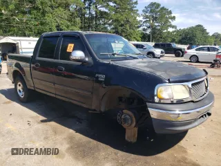 2001 Ford F-150 XLT with VIN 1FTRW07L81KE00951, listed as a Copart auction lot 57348535 with Not provided miles and Salvage title. Bid and sale history available at DreamBid. Image 4.