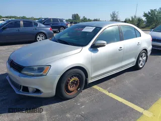 2013 Volkswagen Jetta TDI w/Premium with VIN 3VWLL7AJ0DM385077, listed as a IAAI auction lot 42322406 with 63,428 mi miles and . Bid and sale history available at DreamBid. Image 2.