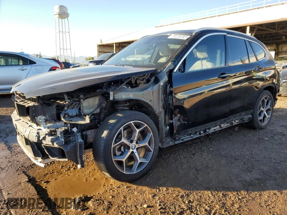 2018 BMW X1 xDrive28i with VIN WBXHT3C37J3H32374, listed as a Copart auction lot 70226702 with 65,796 mi miles. Bid and sale history available at carsss.com. Image 1.