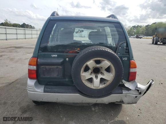 1999 Suzuki Grand Vitara LX with VIN JS3TD62V0X4124366, listed as a Copart auction lot 50885055 with 204,168 mi miles and Salvage Title. Bid and sale history available at carsss.com. Image 6.