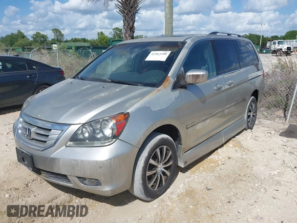 2008 Honda Odyssey Touring with VIN 5FNRL38898B056106, listed as a IAAI auction lot 41963288 with 146,960 mi miles. Bid and sale history available at carsss.com. Image 2.