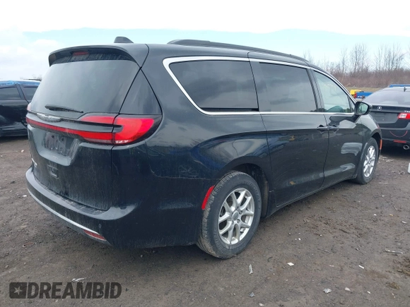 2022 Chrysler Pacifica Touring L with VIN 2C4RC1BG2NR117879, listed as a IAAI auction lot 41845778 with 96,523 mi miles and . Bid and sale history available at DreamBid. Image 4.