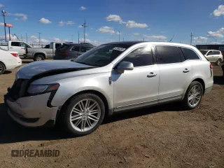 2013 Lincoln MKT EcoBoost with VIN 2LMHJ5AT7DBL56455, listed as a Copart auction lot 47085335 with 82,027 mi miles and Salvage Title. Bid and sale history available at carsss.com. Image 1.