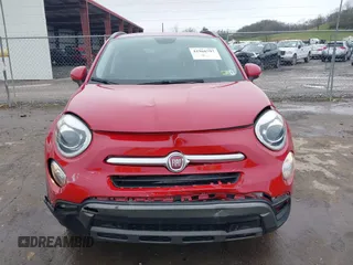 2018 FIAT 500X Trekking z VIN ZFBCFYCB6JP690033, wystawiony jako IAAI lot #41966797 z przebiegiem 129 236 mil mil oraz . Historia ofert i sprzedaży dostępna na DreamBid. Obrazek 6.