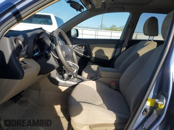 2011 Toyota RAV4 with VIN 2T3BK4DV5BW054067, listed as a Copart auction lot 52183995 with 124,547 mi miles and Salvage Title. Bid and sale history available at carsss.com. Image 7.