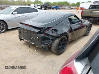 2016 Nissan 370Z with VIN JN1AZ4EHXGM935774, listed as a IAAI auction lot 41976743 with 66,979 mi miles. Bid and sale history available at carsss.com. Image 4.