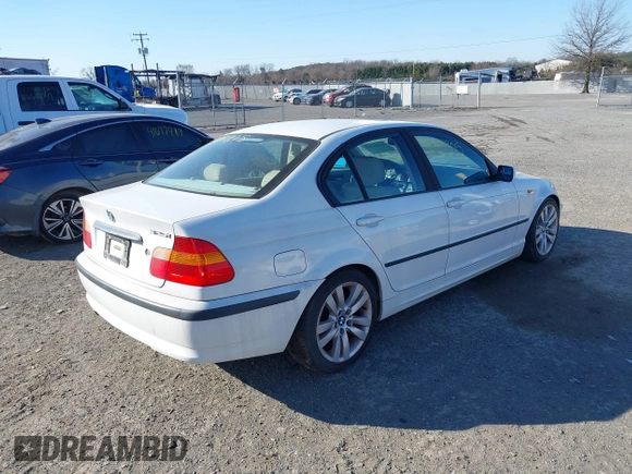 2002 BMW 3 Series 325i with VIN WBAET37492NG77657, listed as a IAAI auction lot 41691705 with 163,700 mi miles. Bid and sale history available at carsss.com. Image 4.