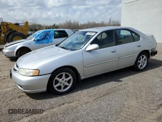 2001 Nissan Altima GXE z VIN 1N4DL01D01C123829, wystawiony jako Copart lot #67290983 z przebiegiem 137 579 mil mil oraz Czysty tytuł • Clean title. Historia ofert i sprzedaży dostępna na DreamBid. Obrazek 1.