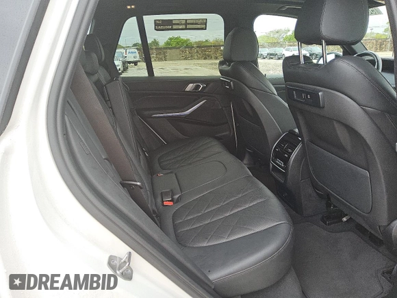 2023 BMW X5 xDrive40i z VIN 5UXCR6C08P9P32642, wystawiony jako Copart lot #56059525 z przebiegiem 48 802 mil mil oraz Czysty tytuł • Clean title. Historia ofert i sprzedaży dostępna na DreamBid. Obrazek 6.