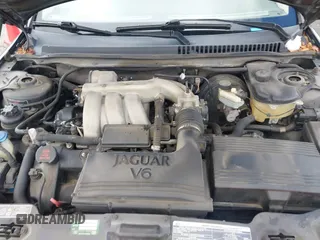 2004 Jaguar X-Type with VIN SAJEA51C44WD56659, listed as a IAAI auction lot 41712395 with Not Provided miles and . Bid and sale history available at DreamBid. Image 10.