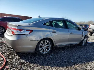 2014 Hyundai Azera с VIN KMHFG4JG6EA354742, выставлен на аукционе Copart как лот 48163345 с пробегом 104 983 миль миль и Списание • Salvage title. История ставок и продаж доступна на DreamBid. Изображение 3.