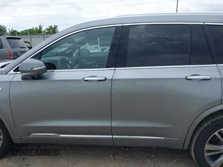 2025 Cadillac XT6 FWD Premium Luxury with VIN 1GYKPCRS0SZ119055, listed as a IAAI auction lot 42574001 with 17,137 mi miles and . Bid and sale history available at DreamBid. Image 14.