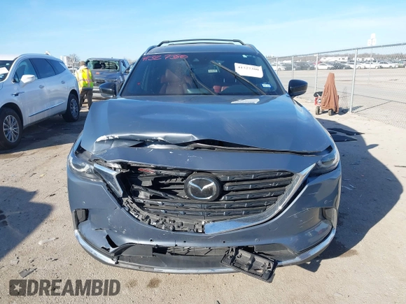 2022 Mazda CX-9 Grand Touring with VIN JM3TCBDYXN0625567, listed as a IAAI auction lot 41327380 with 50,672 mi miles and . Bid and sale history available at DreamBid. Image 11.
