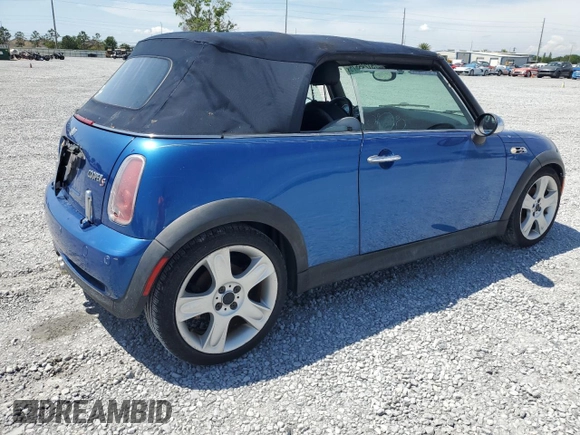2006 MINI Convertible S with VIN WMWRH33566TK58973, listed as a Copart auction lot 51295575 with Not provided miles and Salvage title. Bid and sale history available at DreamBid. Image 3.