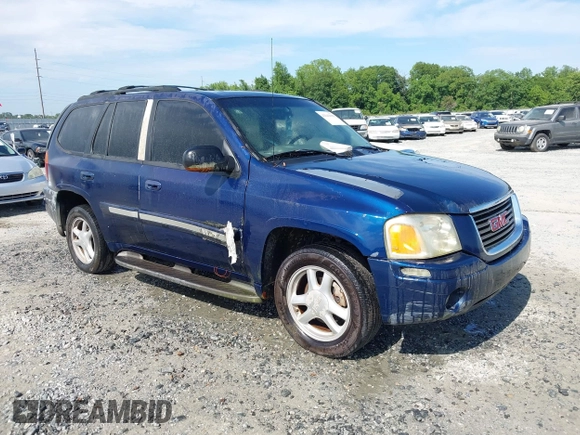2003 GMC Envoy SLE z VIN 1GKDS13S032346173, wystawiony jako IAAI lot #42142925 z przebiegiem 304 447 mil mil oraz . Historia ofert i sprzedaży dostępna na DreamBid. Obrazek 1.