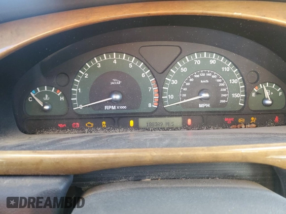 2003 Jaguar S-Type z VIN SAJEA01U03HM57757, wystawiony jako Copart lot #73440434 z przebiegiem 188 389 mil mil oraz Szkoda całkowita • Salvage title. Historia ofert i sprzedaży dostępna na DreamBid. Obrazek 9.
