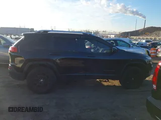2015 Jeep Cherokee Latitude with VIN 1C4PJMCS0FW745949, listed as a IAAI auction lot 41289847 with 137,440 mi miles and . Bid and sale history available at carsss.com. Image 13.