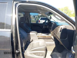 2015 GMC Sierra 1500 Denali with VIN 3GTU2WEJ6FG400004, listed as a IAAI auction lot 42097356 with 148,544 mi miles and . Bid and sale history available at DreamBid. Image 5.