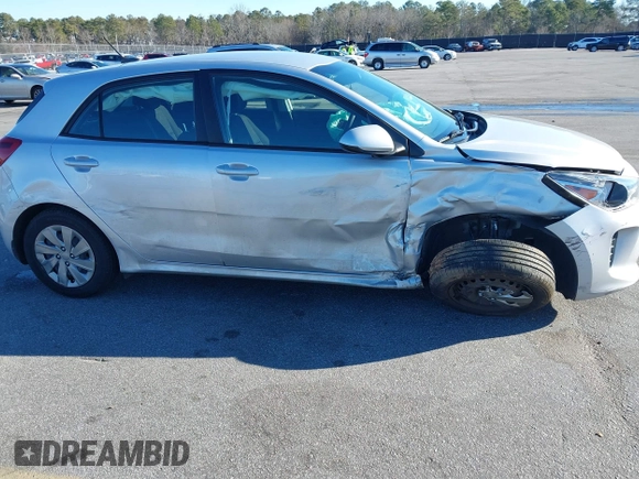 2020 Kia Rio S with VIN 3KPA25AD7LE348113, listed as a IAAI auction lot 41365528 with 43,633 mi miles and . Bid and sale history available at DreamBid. Image 6.