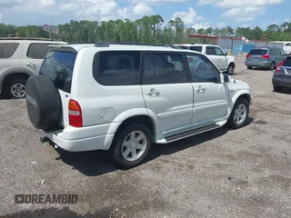 2002 Suzuki XL7 Standard z VIN JS3TY92V624101978, wystawiony jako IAAI lot #42399967 z przebiegiem 179 364 mil mil oraz . Historia ofert i sprzedaży dostępna na DreamBid. Obrazek 4.