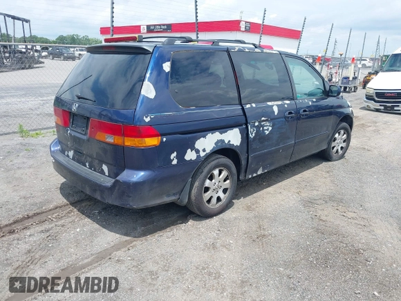2003 Honda Odyssey EX-L z VIN 5FNRL18923B101344, wystawiony jako IAAI lot #42379995 z przebiegiem 222 877 mil mil oraz . Historia ofert i sprzedaży dostępna na DreamBid. Obrazek 4.