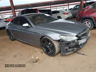 2014 BMW 6 Series 640i z VIN WBA6A0C58ED317570, wystawiony jako IAAI lot #41602084 z przebiegiem 94 271 mil mil oraz . Historia ofert i sprzedaży dostępna na DreamBid. Obrazek 1.