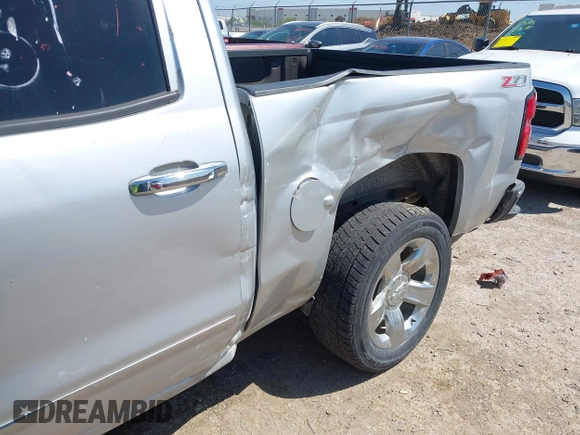 2014 Chevrolet Silverado 1500 LTZ with VIN 3GCUKSEC3EG163562, listed as a IAAI auction lot 41978091 with 166,300 mi miles and . Bid and sale history available at DreamBid. Image 6.