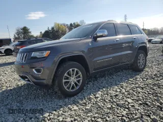 2015 Jeep Grand Cherokee Overland with VIN 1C4RJFCMXFC237723, listed as a Copart auction lot 50318145 with 103,741 mi miles and Salvage title. Bid and sale history available at DreamBid. Image 1.