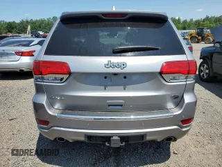 2018 Jeep Grand Cherokee Overland with VIN 1C4RJFCG2JC212947, listed as a Copart auction lot 59503405 with 76,436 mi miles and Clean title. Bid and sale history available at DreamBid. Image 6.