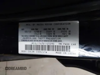 2014 Mazda Mazda6 i Touring with VIN JM1GJ1T67E1125290, listed as a IAAI auction lot 42041112 with 114,875 mi miles. Bid and sale history available at carsss.com. Image 9.