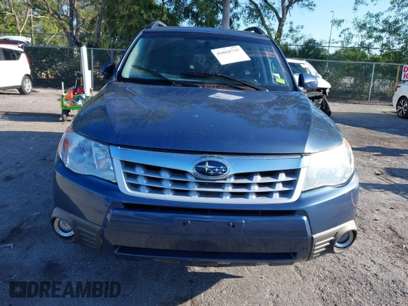 2011 Subaru Forester 2.5X Limited with VIN JF2SHAEC1BH754640, listed as a IAAI auction lot 42018735 with 130,780 mi miles. Bid and sale history available at carsss.com. Image 13.