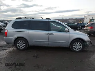2007 Kia Sedona LX with VIN KNDMB233976172127, listed as a IAAI auction lot 41557356 with 164,383 mi miles. Bid and sale history available at carsss.com. Image 13.