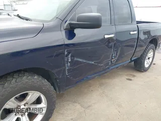 2015 Ram 1500 Outdoorsman z VIN 1C6RR7GT6FS508211, wystawiony jako IAAI lot #42044889 z przebiegiem 125 774 mil mil oraz . Historia ofert i sprzedaży dostępna na DreamBid. Obrazek 6.