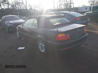 2004 BMW 3 Series 325Ci with VIN WBABW33474PG98269, listed as a IAAI auction lot 41457542 with 999,999 mi miles. Bid and sale history available at carsss.com. Image 3.