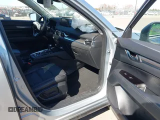 2023 Mazda CX-5 2.5 S Premium Package with VIN JM3KFBDM9P0173453, listed as a IAAI auction lot 41807979 with 34,156 mi miles. Bid and sale history available at carsss.com. Image 5.