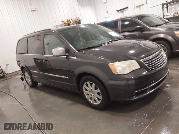 2011 Chrysler Town & Country Touring L with VIN 2A4RR8DG3BR676240, listed as a IAAI auction lot 41980939 with 184,524 mi miles and . Bid and sale history available at DreamBid. Image 1.