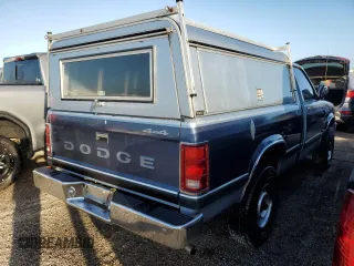 1989 Dodge Dakota z VIN 1B7GG26X9KS021432, wystawiony jako Copart lot #78311494 z przebiegiem 106 224 mil mil oraz Nie do naprawy • Non repairable. Historia ofert i sprzedaży dostępna na DreamBid. Obrazek 3.