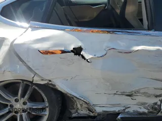 2013 Tesla Model S z VIN 5YJSA1DN0DFP18592, wystawiony jako Copart lot #62151505 z przebiegiem 192 283 mil mil oraz Szkoda całkowita • Salvage title. Historia ofert i sprzedaży dostępna na DreamBid. Obrazek 10.