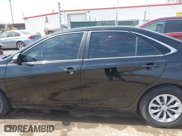 2016 Toyota Camry XLE with VIN 4T4BF1FK0GR581297, listed as a IAAI auction lot 42059507 with 151,777 mi miles. Bid and sale history available at carsss.com. Image 15.