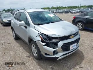 2021 Chevrolet Trax LT with VIN KL7CJPSB8MB305061, listed as a IAAI auction lot 42355379 with 130,885 mi miles and . Bid and sale history available at DreamBid. Image 1.