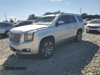2020 GMC Yukon Denali with VIN 1GKS2CKJ1LR112319, listed as a Copart auction lot 75936154 with 112,187 mi miles and Salvage Title. Bid and sale history available at carsss.com. Image 1.