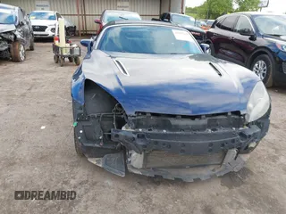 2009 Saturn Sky Red Line z VIN 1G8MT35X09Y105064, wystawiony jako IAAI lot #42197028 z przebiegiem 106 673 mil mil oraz . Historia ofert i sprzedaży dostępna na DreamBid. Obrazek 6.