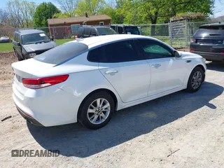 2016 Kia Optima LX z VIN 5XXGT4L3XGG080662, wystawiony jako IAAI lot #42048361 z przebiegiem 99 564 mil mil oraz . Historia ofert i sprzedaży dostępna na DreamBid. Obrazek 4.