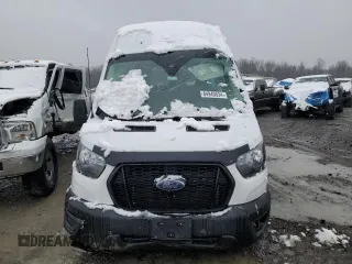 2023 Ford Transit with VIN 1FDAX2X84PKA86334, listed as a Copart auction lot 84940534 with 14,670 mi miles and Salvage Title. Bid and sale history available at DreamBid. Image 5.