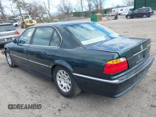 2000 BMW 7 Series 740iL with VIN WBAGH8343YDP13075, listed as a IAAI auction lot 42050589 with 999,999 mi miles. Bid and sale history available at carsss.com. Image 3.