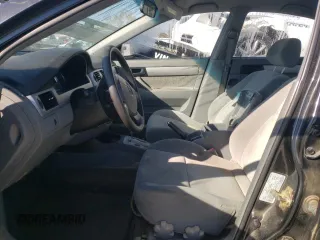 2005 Suzuki Forenza S z VIN KL5JD56Z55K171906, wystawiony jako Copart lot #83628624 z przebiegiem Nie podano mil oraz Szkody całkowita. Historia ofert i sprzedaży dostępna na DreamBid. Obrazek 7.