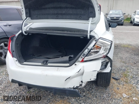 2019 Honda Civic Sport with VIN 2HGFC2F85KH512587, listed as a IAAI auction lot 41708347 with 63,895 mi miles and . Bid and sale history available at DreamBid. Image 16.