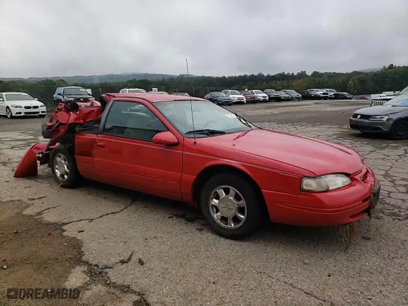 1996 Ford Thunderbird LX with VIN 1FALP62W8TH174603, listed as a Copart auction lot 72928574 with 153,614 mi miles and Salvage Title. Bid and sale history available at carsss.com. Image 11.
