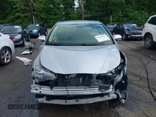 2022 Toyota Prius L Eco with VIN JTDKAMFU2N3161592, listed as a IAAI auction lot 42245464 with 146,891 mi miles and . Bid and sale history available at DreamBid. Image 13.