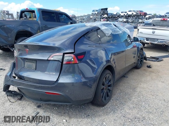 2022 Tesla Model Y Long Range z VIN 7SAYGDEE8NF443194, wystawiony jako IAAI lot #42259205 z przebiegiem 38 540 mil mil oraz . Historia ofert i sprzedaży dostępna na DreamBid. Obrazek 4.